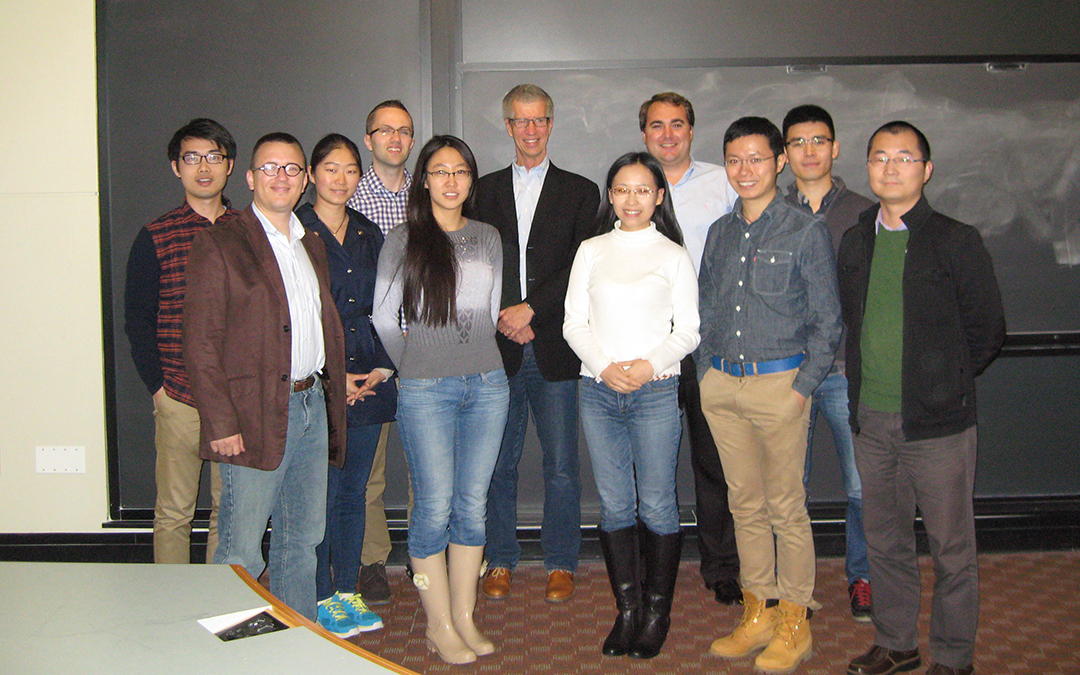 Finance doctoral students with speaker Kent Daniel (Nancy Crouch/UConn School of Business)
