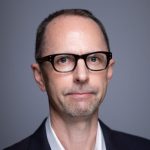 Portrait of Travis Grosser.