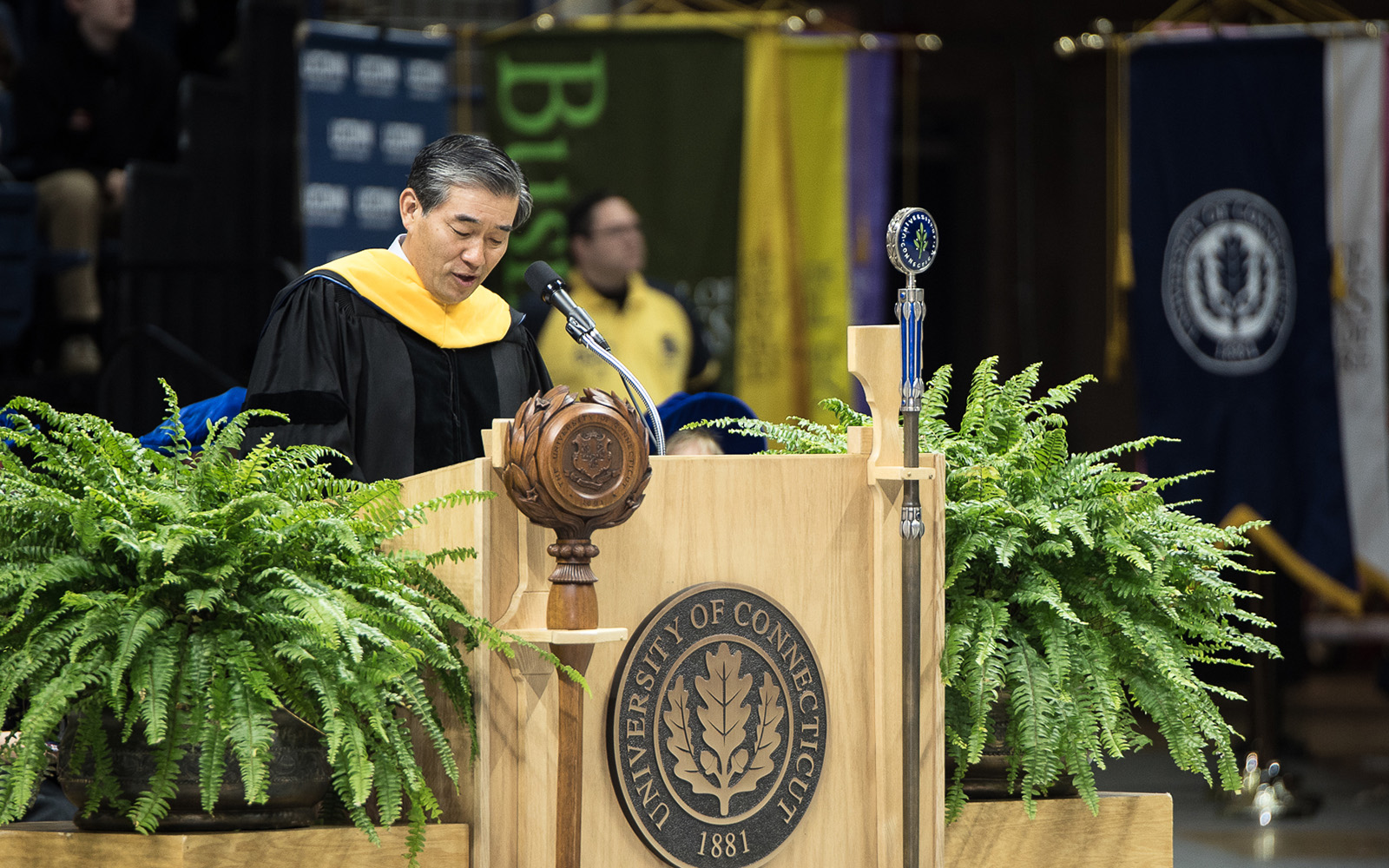 John Y. Kim '87 MBA, president and CIO of New York Life, offers advice to School of Business graduates during commencement on May 8. (Nathan Oldham/UConn School of Business)