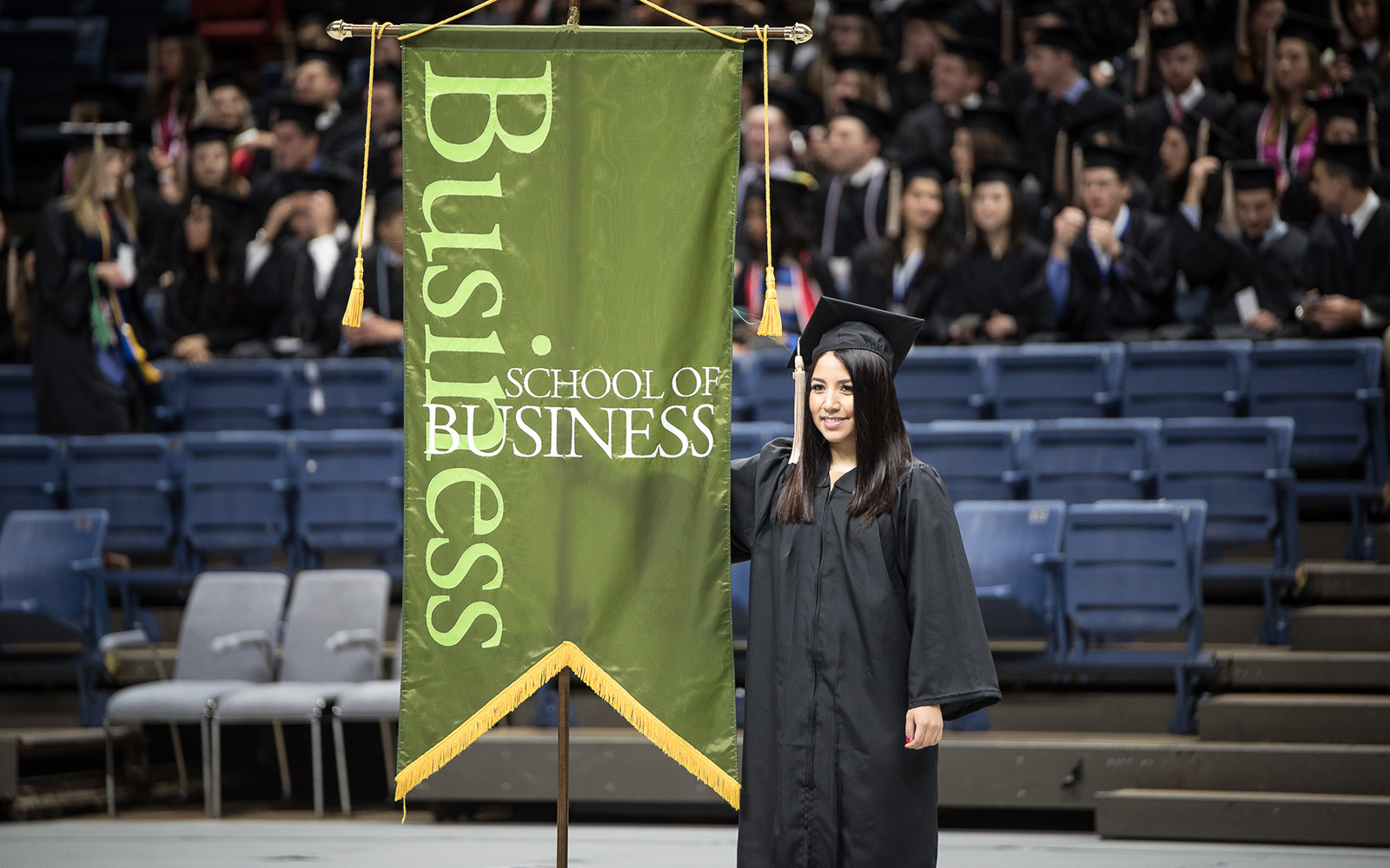 Andrea Jimenez at the 2016 UConn School of Business undergraduate commencement ceremony. (Nathan Oldham/UConn School of Business)