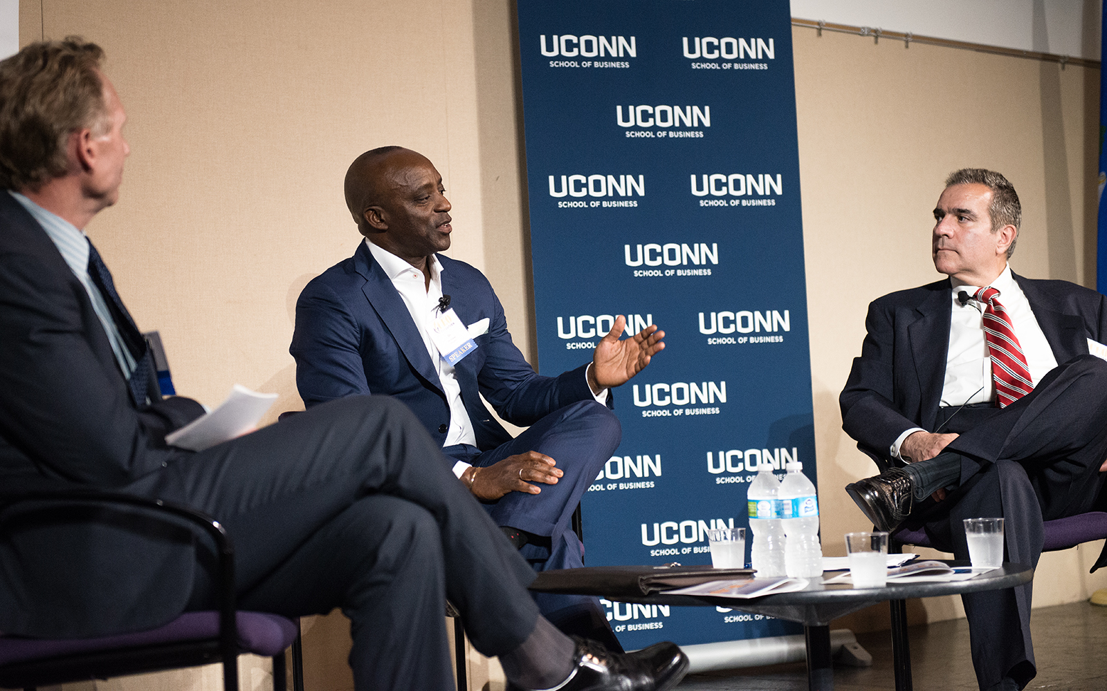 From left: Mark Fagan, office managing partner at Citrin Cooperman, Oni Chukwu, CEO and member of the board of directors at etouches, and John J. Preli, director of regulatory management and governance for The Weather Co. (Nathan Oldham/UConn School of Business)