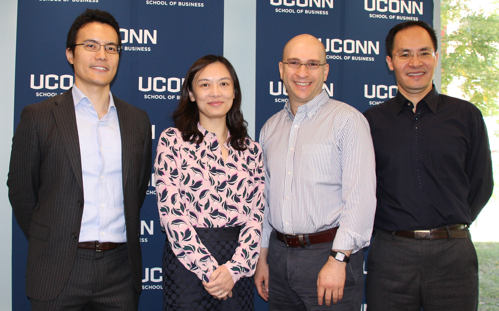 From left: Shijie Lu, Ying Xie, Yakov Bart, and Xueming Luo. (Nancy White/UConn School of Business)