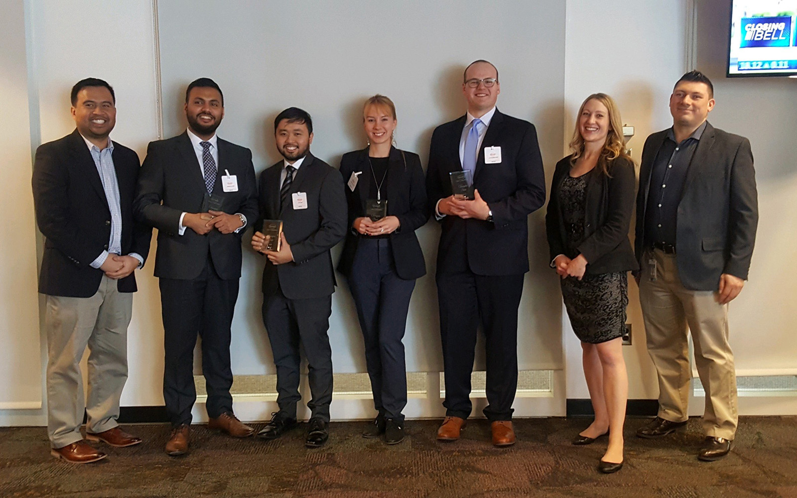 Kseniia Poiarkina ’18 MBA (center) poses for a photo with teammates and Henkel representatives following her team’s case competition win. (Kseniia Poiarkina '18 MBA/UConn School of Business)