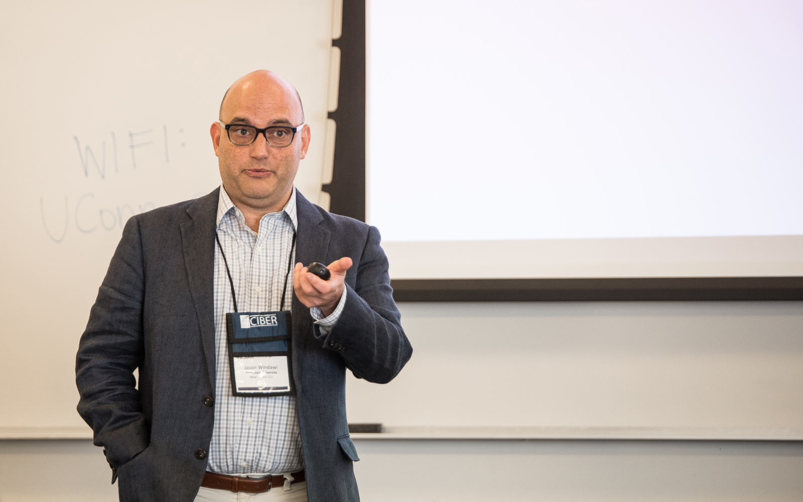 A. Jason Windawi, a Ph.D. student at Princeton University, explained his research about "Building on the Blockchain: The Interplay of Organization and Technology in Emergent Field.'' (Nathan Oldham/UConn School of Business)