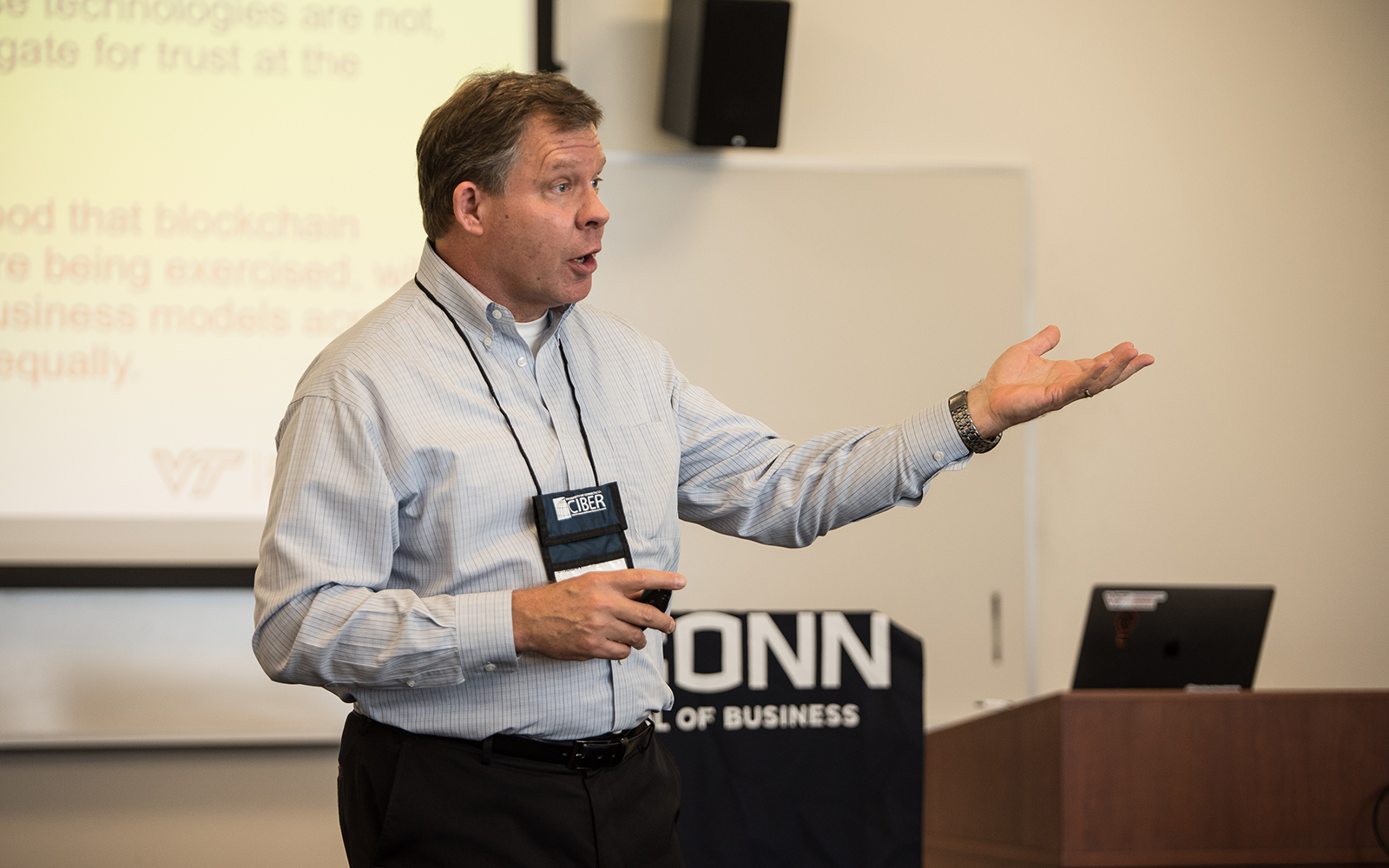 Mark Mondry, a professor at Virginia Tech, discusses his research on Blockchain and trust concerns in transactional organizations. (Nathan Oldham/UConn School of Business)
