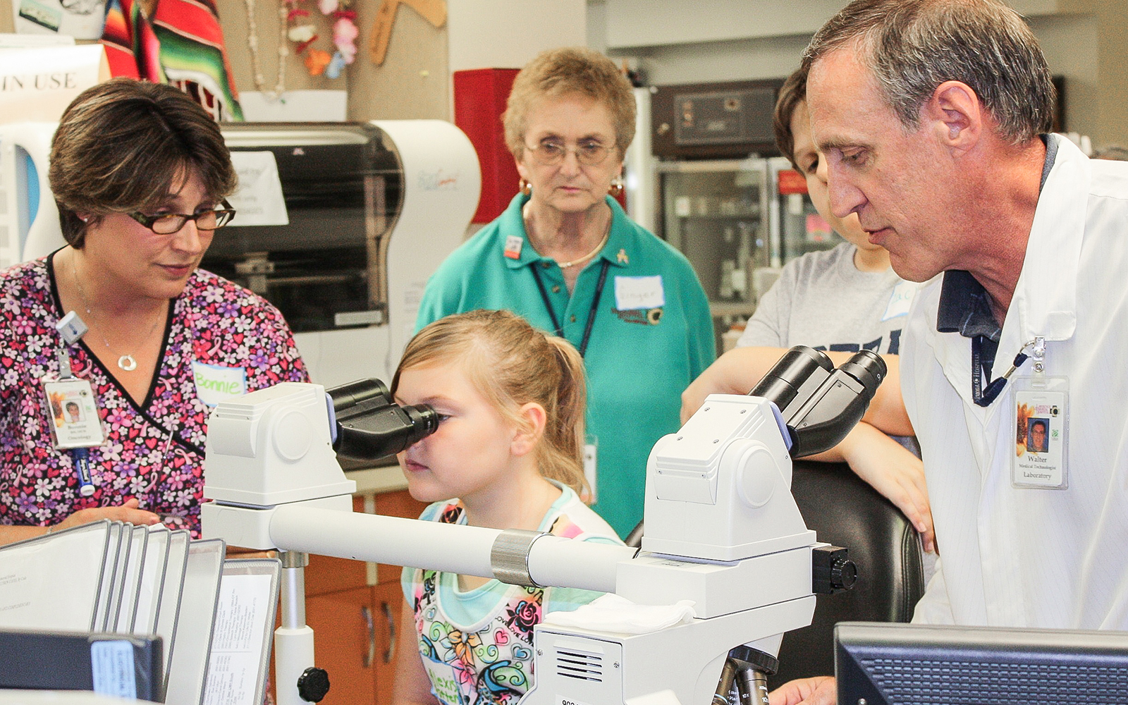 A participant gets "a close up look at cancer" in the program at Lawrence Memorial Hospital Oncology in Lawrence, Kansas. (Peter R. van Dernoot)