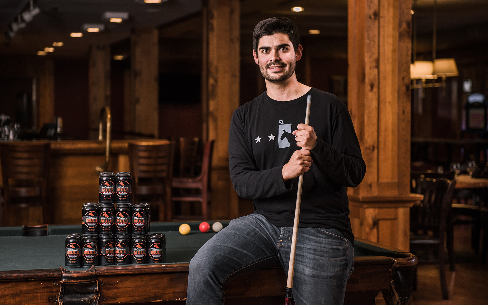 Dean Mahoney '09, pictured above, co-founded ‘Merican Mule in 2015. He is spearheading East Coast distribution of his company's namesake, an alcoholic beverage inspired by the Moscow Mule. (Nathan Oldham/UConn School of Business)