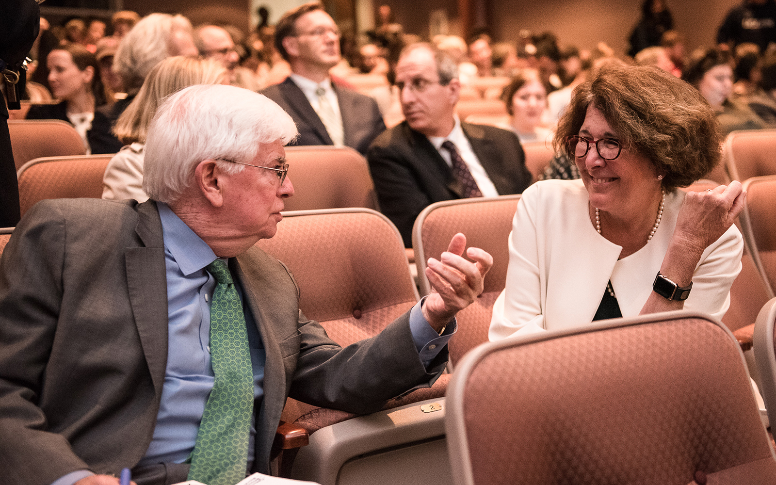 Amy Domini, the keynote speaker for the Business & Human Rights Initative Symposium, speaks with former U.S. Senator Christopher Dodd.