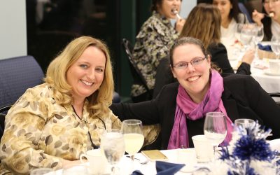 Alumna Allegra Klein, ’18 MBA and Michele Metcalf, director of the CIBER program, share a light moment during the event. (Arminda Kamphausen, UConn School of Business)