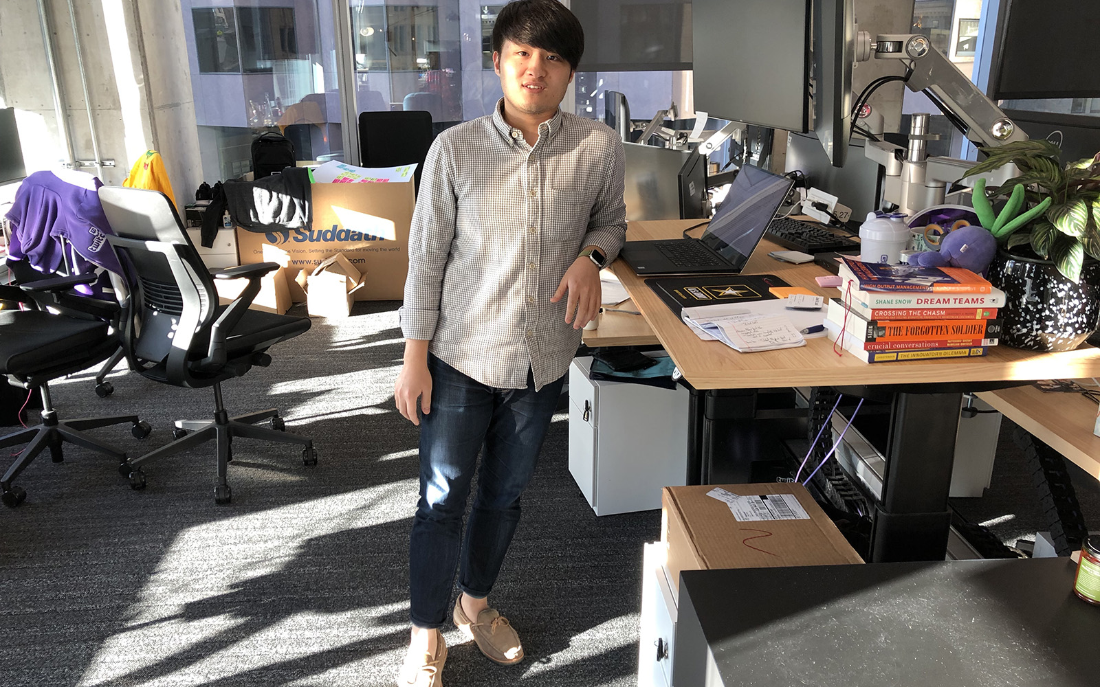 Jimmy Tang '11 (BUS), in his office at the Twitch headquarters in San Francisco. (Photo courtesy of Jimmy Tang)