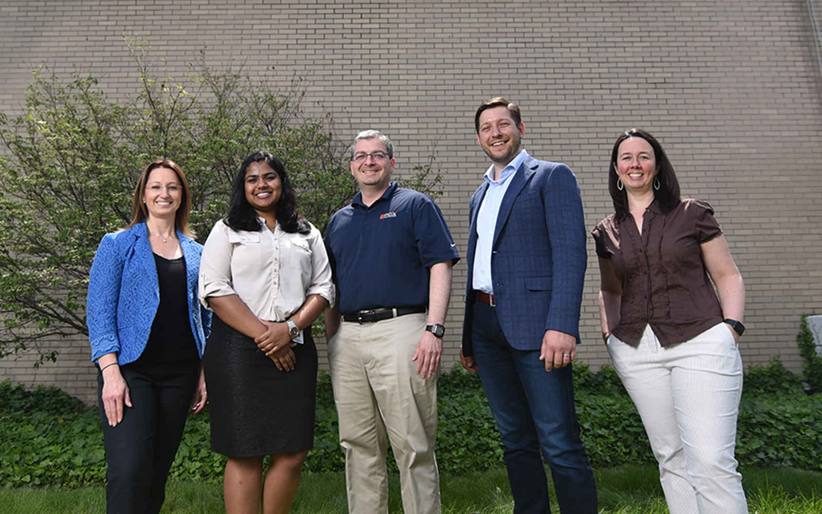 Left to right, professor Anna Radziwillowicz, MSBAPM student Chitra Reddy, PCX general manager and COO Aris Fotos, MBA Student Don Pendagast, and professor Jennifer Eigos. (Nathan Oldham / UConn School of Business)