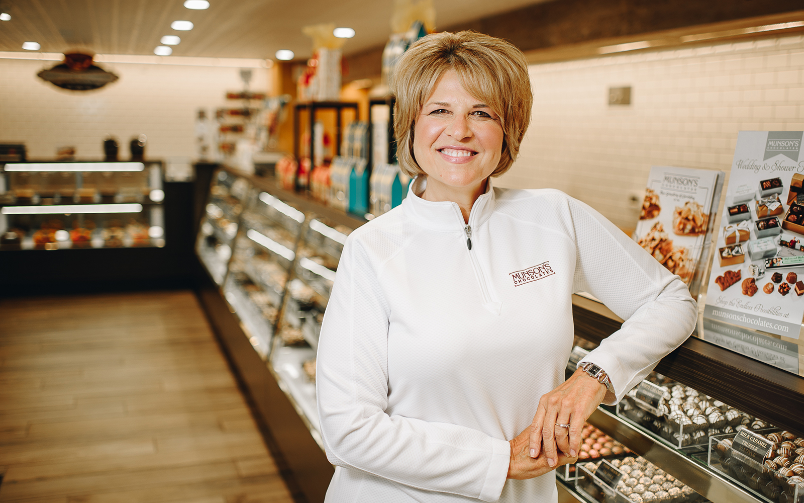 Karen Munson, the president of Munson's Chocolates, in her retail store in Bolton, CT.  At this location, Munson's produces 350,000 pounds of chocolate per year.  (Nathan Oldham / UConn School of Business)