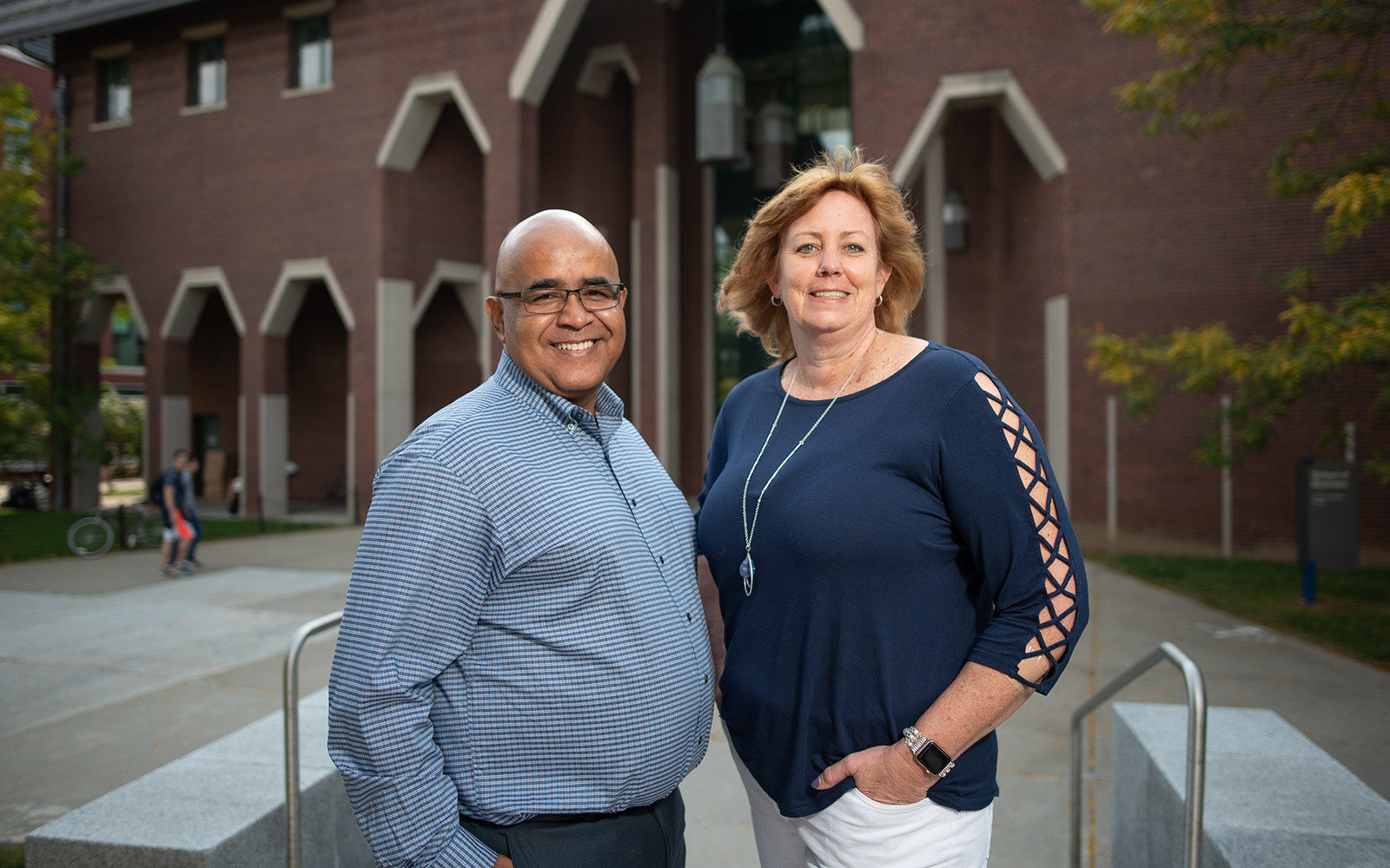 Jose M. Cruz (left) and Lucy Gilson (right) have been named associate deans in the UConn School of Business.  Gilson has taken on the mantle of associate dean for faculty and outreach, while Cruz is now the associate dean for graduate programs. (Nathan Oldham / UConn School of Business)