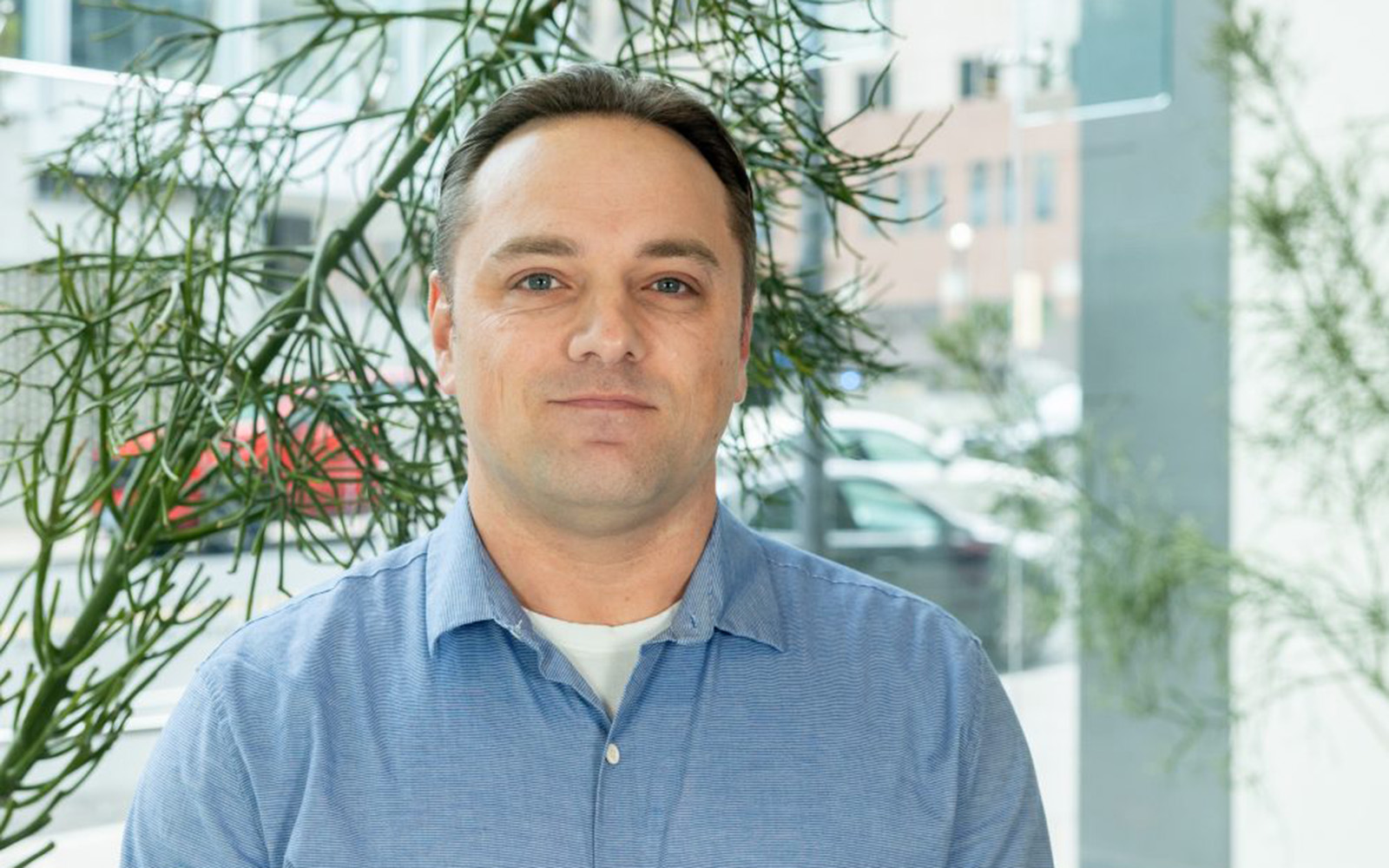Marc Massicotte '25 MBA poses for a photo in the Business Building in Hartford on Wednesday, March 26, 2025. (Sydney Herdle/UConn Photo)