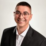 Portrait of Justin Cooper.