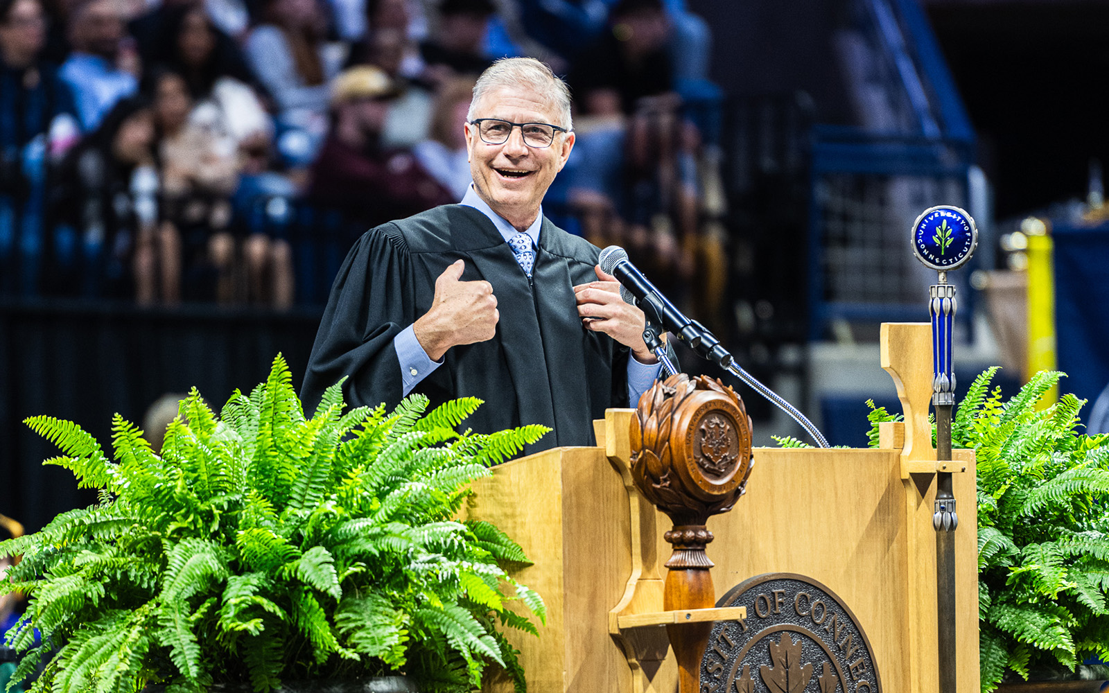 Rich Eldh '81 delivers the keynote address at Commencement 2025 in Storrs, CT.